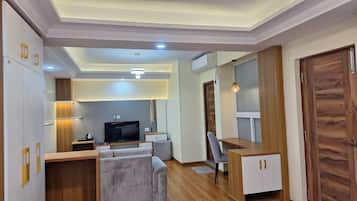 Habitación Deluxe con 1 cama doble o 2 individuales | Zona de estar