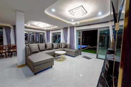 40-inch flat-screen TV with cable channels. BanIngKhao Pool Villa Sriracha