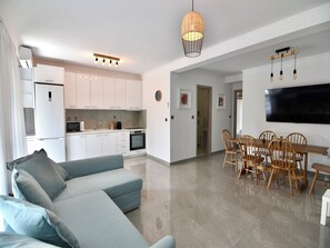TV - Renata apartment in Nikiti (Halkidiki city)
