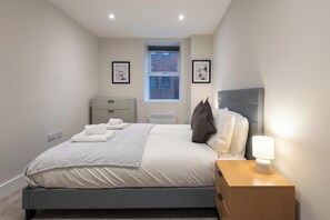 1 dormitorio, tabla de planchar con plancha, wifi gratis y ropa de cama