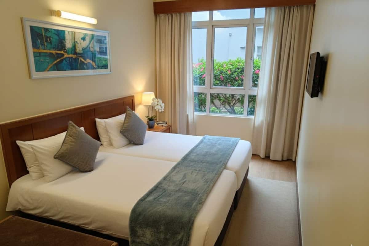 Habitación básica, 2 camas individuales, no fumadores, baño privado | Ropa de cama