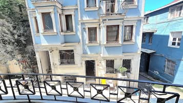 Deluxe Triple Room, Balcony | Property grounds