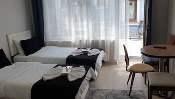 Deluxe Triple Room, Balcony | Iron/ironing board, free WiFi