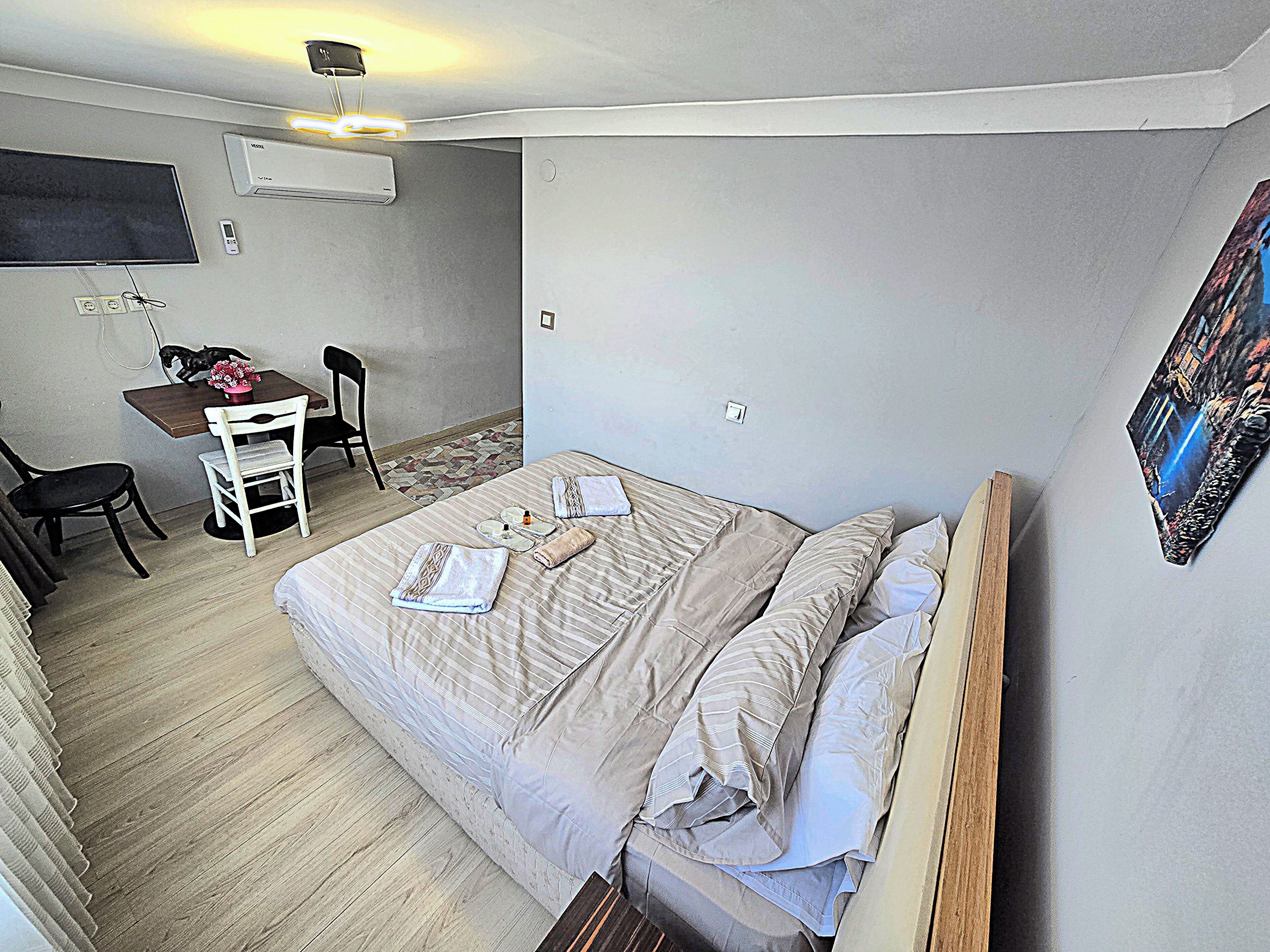 Deluxe Quadruple Room | Iron/ironing board, free WiFi