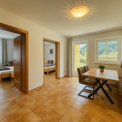 Stylish mountain apartment with terrace in Flattach near Mölltal Glacier