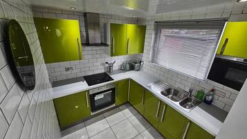 Fridge, microwave, oven, cookware/dishes/utensils