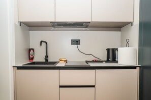 Departamento Deluxe, balcón | Cocina privada