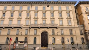 A large, historic building with a symmetrical facade, multiple windows, and a central entrance. - Castello Sforzesco, Lieux Caches Undermyname (Milano)