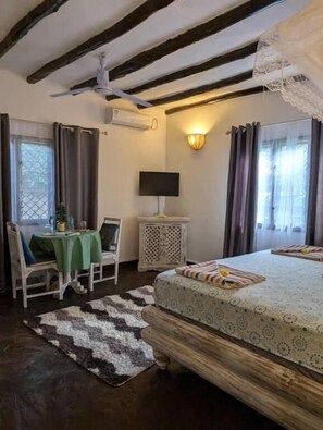 Habitació doble Deluxe, vistes al jardí | Wifi gratuïta i roba de llit 