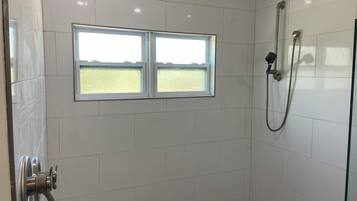 Shower, towels, soap, shampoo