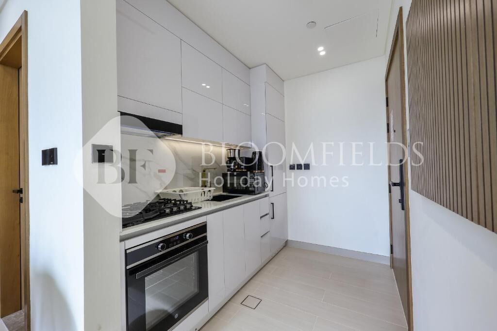 Departamento, balcón, vista a la ciudad | Cocina privada