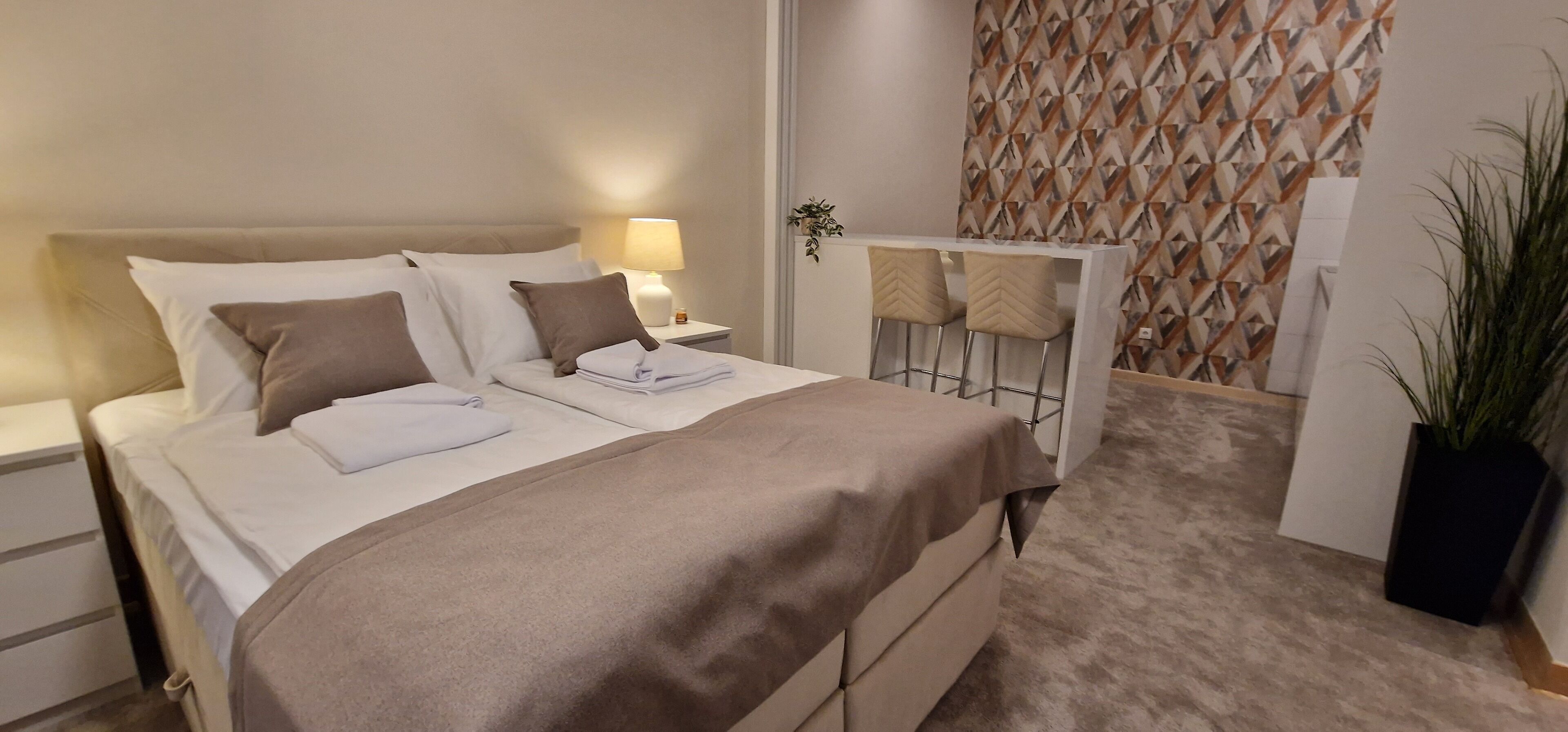 Apartment, Patio, Courtyard View | In-room safe, soundproofing, iron/ironing board, free WiFi