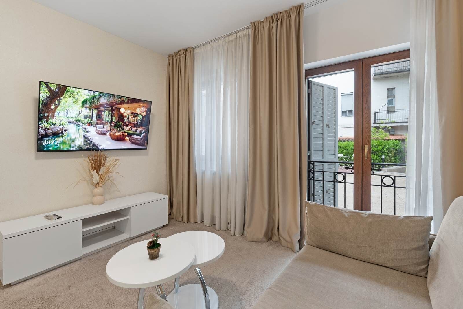 Deluxe Apartment, Patio, Courtyard View | In-room safe, soundproofing, iron/ironing board, free WiFi