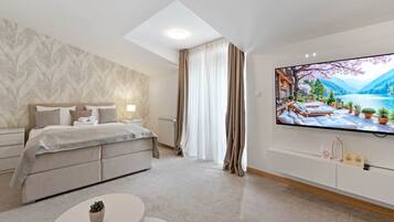Apartment, Patio, Courtyard View | In-room safe, soundproofing, iron/ironing board, free WiFi