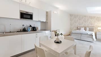 Apartment, Patio, Courtyard View | In-room safe, soundproofing, iron/ironing board, free WiFi
