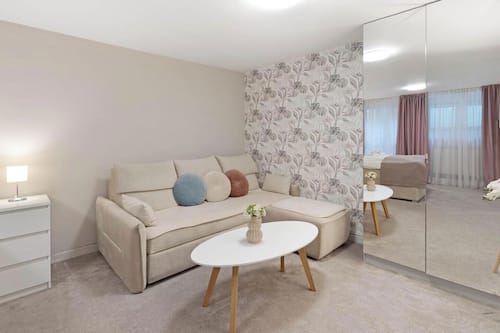 Apartament Deluxe, pati | Caixa forta a l'habitació i habitacions insonoritzades