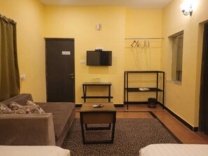 Kahden hengen deluxe-huone (yksi tai kaksi sänkyä) | Oleskelualue