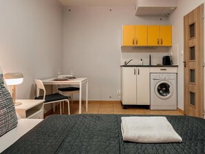 Apartamento econômico | Ferros/tábuas de passar roupa, Wi-Fi de cortesia