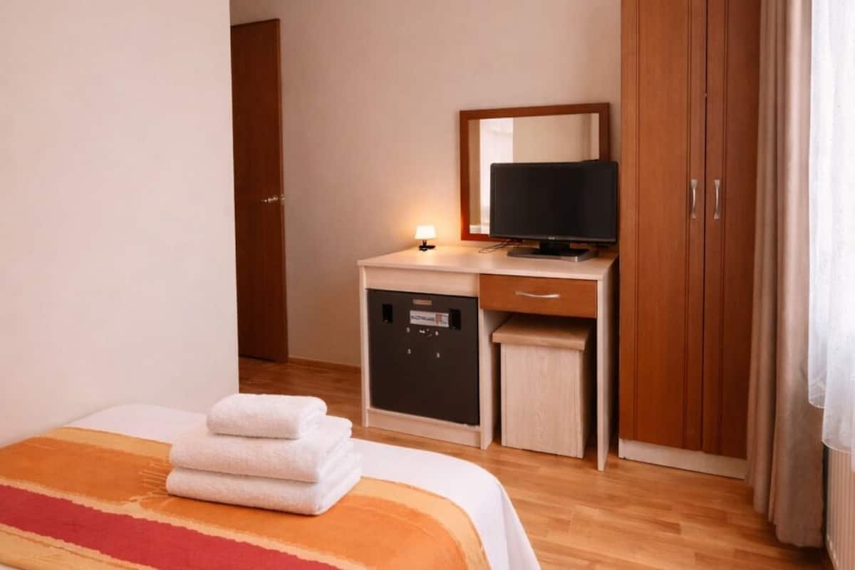 Premium bedding, minibar, desk, laptop workspace