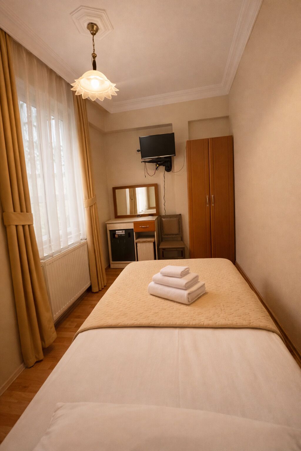 Habitación individual | Ropa de cama de alta calidad, minibar, escritorio