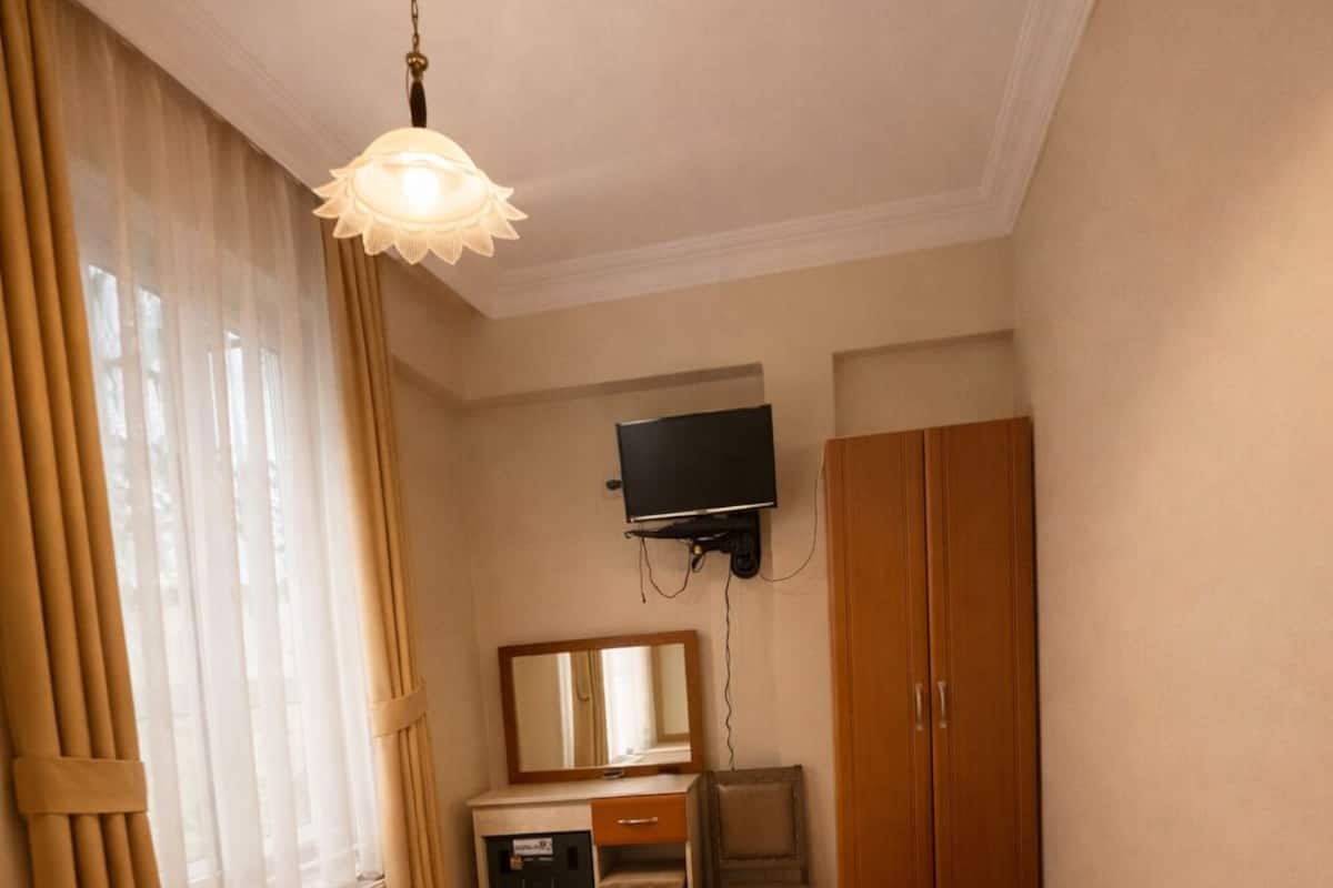 Habitación individual | Ropa de cama de alta calidad, minibar, escritorio