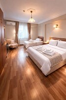 Quarto superior | Roupas de cama premium, frigobar, escrivaninha