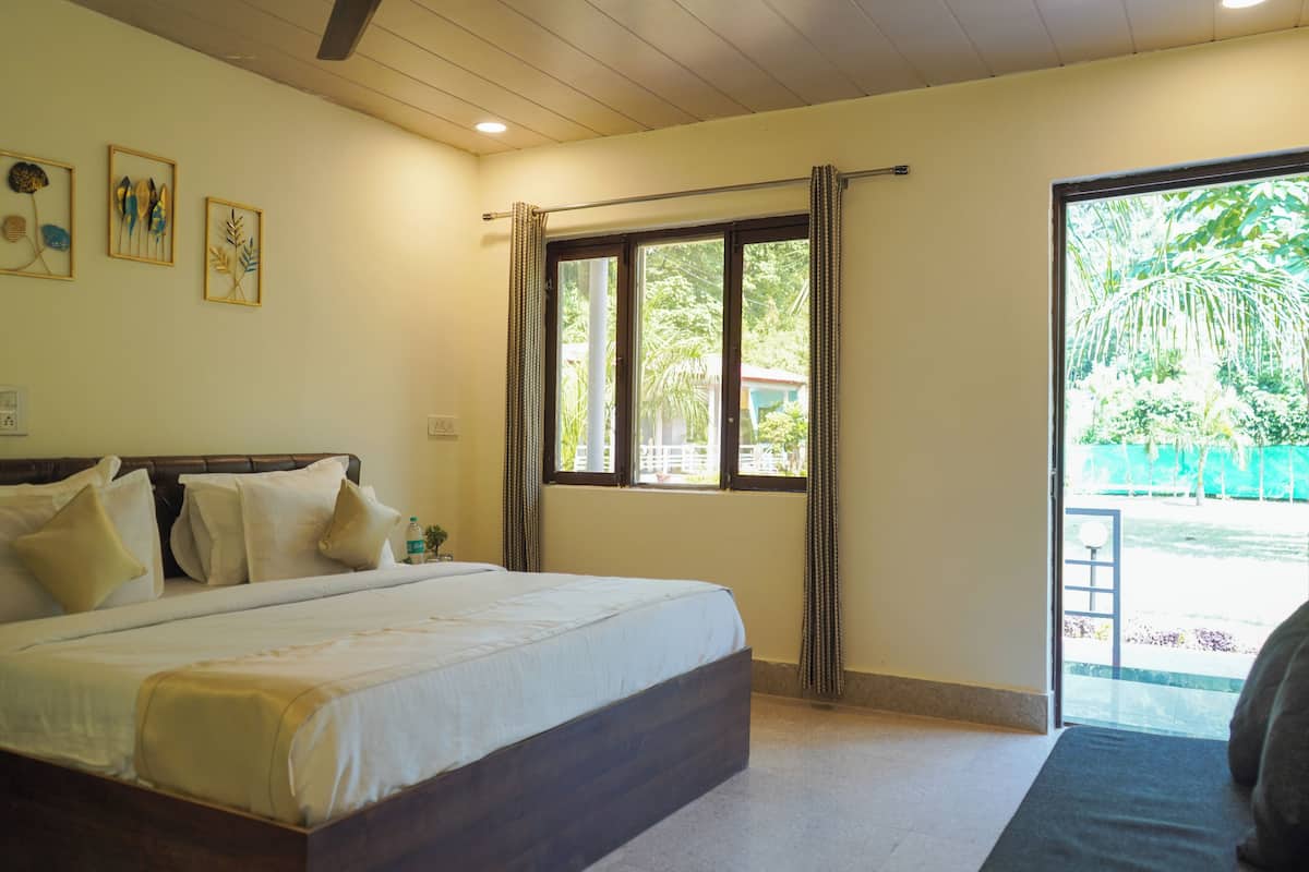 Premier Cottages | Vista al jardín