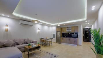 Deluxe dubbelrum eller tvÄbÀddsrum - balkong | Vardagsrum