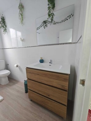 Hair dryer, towels, soap, toilet paper