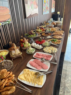 Daily buffet breakfast (USD 5 per person)