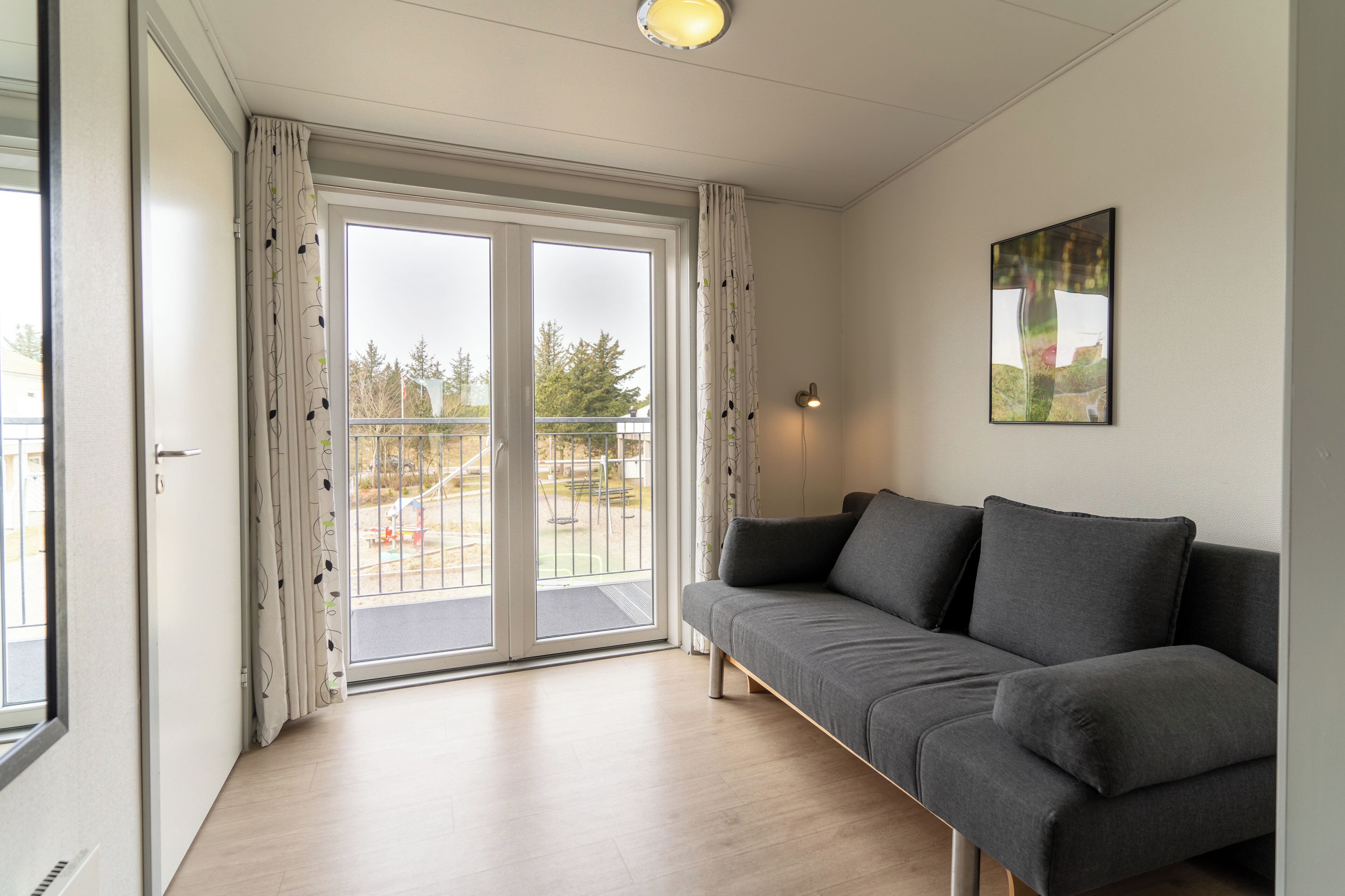 Apartment, 3 Schlafzimmer, Blick auf den Innenhof | Wohnbereich | Flachbildfernseher, Tischfußball, Tischtennisplatte, Bücher