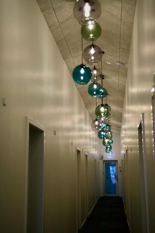 Habitación cuádruple Deluxe, vistas parciales al mar | Interior