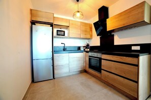 Private kitchen - T2 apartment close to all amenities 5 min from pinarello beach (Zonza)