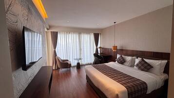 Family Suite, 1 King Bed, City View | Iron/ironing board, free WiFi