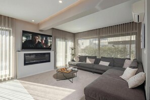 Family Villa, Multiple Bedrooms (Villa Centinera) | Living area | 21-inch flat-screen TV with digital channels - Villa Centinera (Medulin)