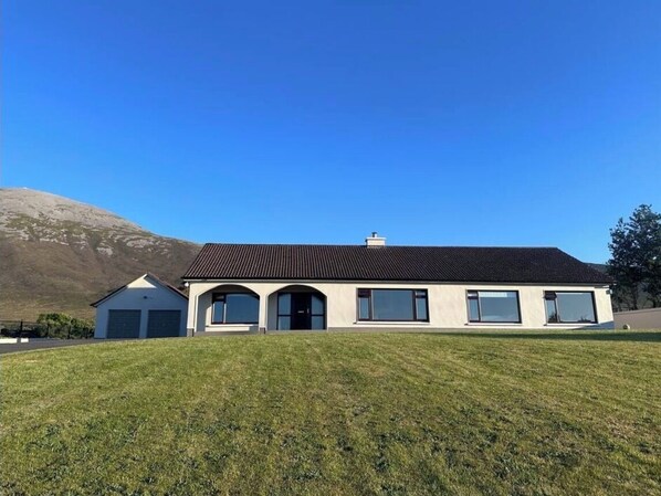 Unclassified image, 1 of 25, button - Sliabh na mara -Where the Reek meets theBay. (Murrisk)