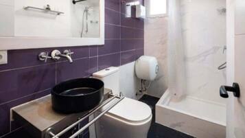 Shower, eco-friendly toiletries, hair dryer, towels