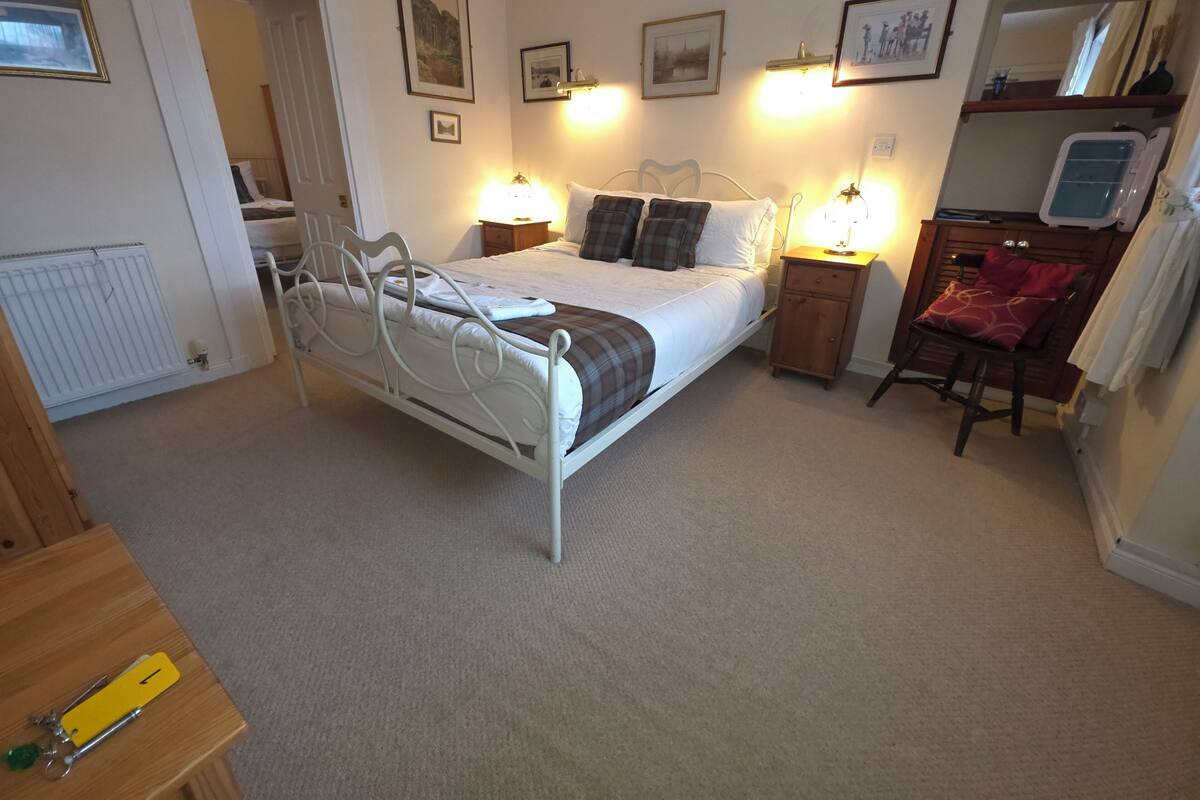 Family Triple Room, Garden View | Hypo-allergenic bedding available, blackout drapes, WiFi (free)