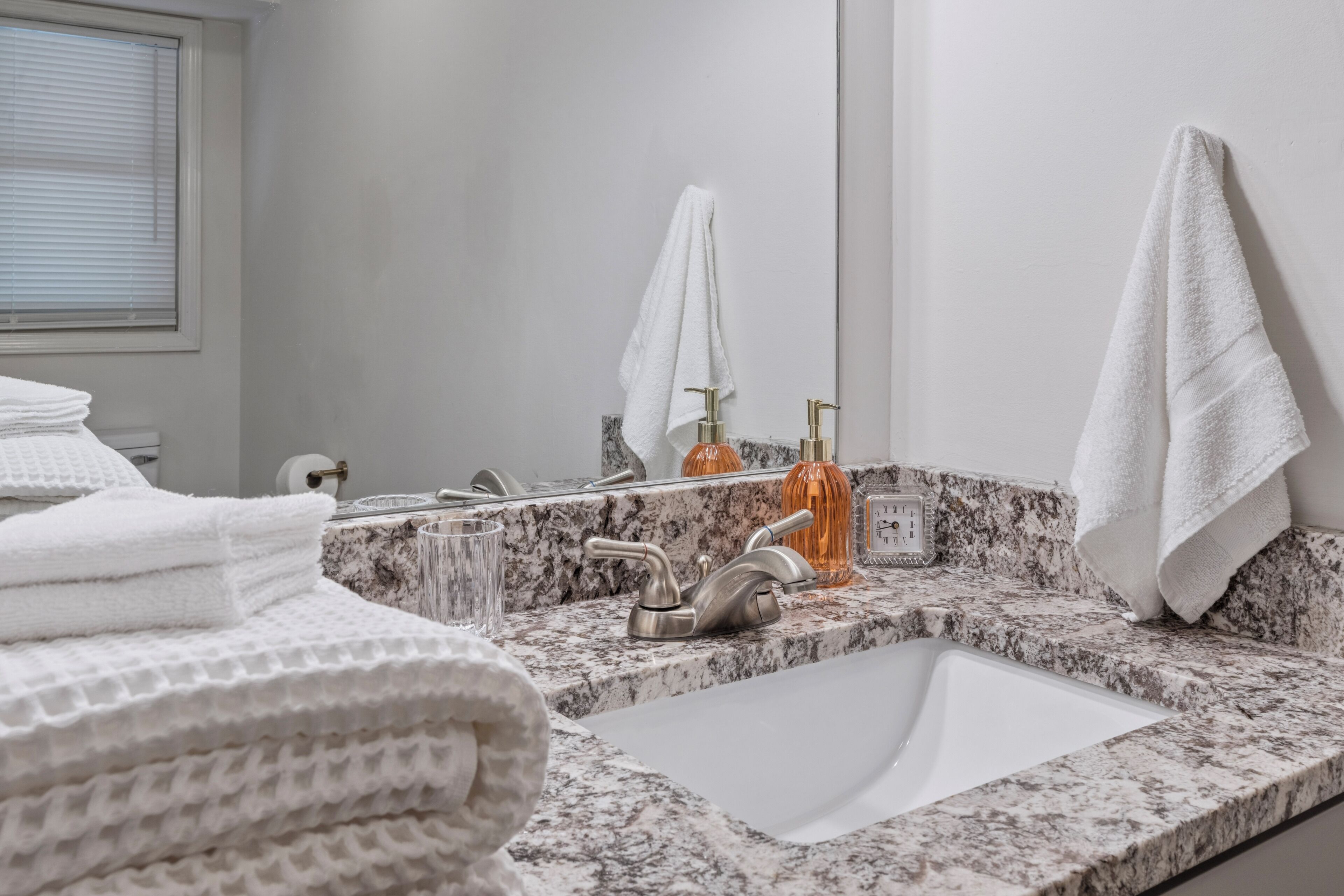 Hair dryer, towels, soap, toilet paper
