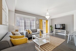 Living room - Modern House Steps From Dining, Shopping & Lakes (Aurora)