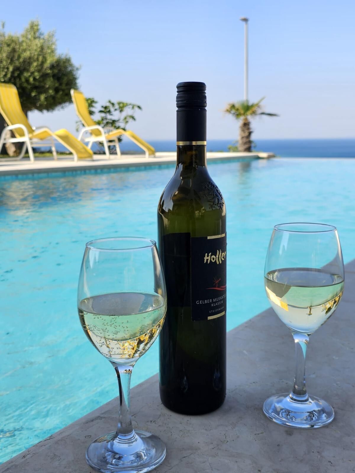 Seasonal outdoor pool, open 9:00 AM to 9:00 PM, pool loungers