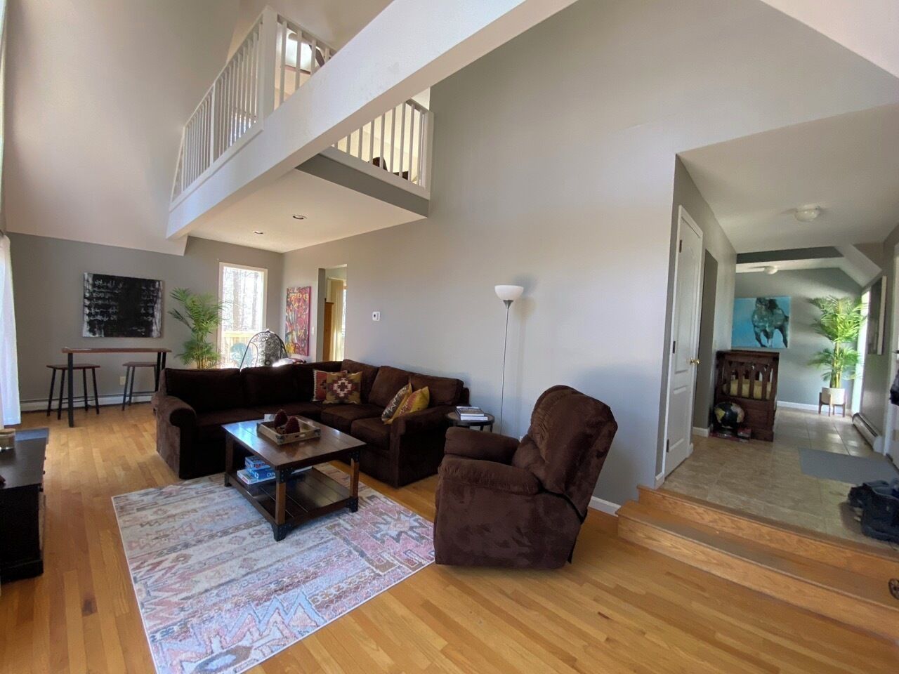 Smart TV, fireplace, books, computer monitors