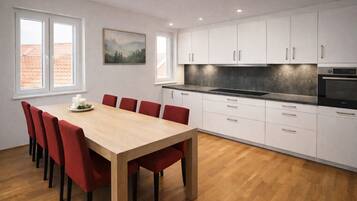 Family Condo, City View | Private kitchen | Fridge