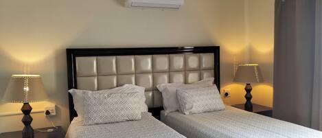 Premium bedding, down duvets, in-room safe, desk