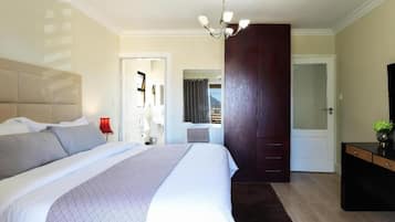 Deluxe Double or Twin Room, Pool View | In-room safe, desk, blackout curtains, iron/ironing board