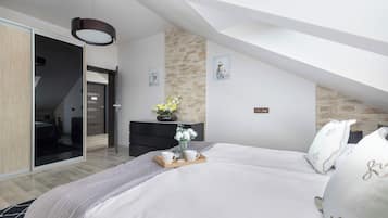 2 dormitorios, tabla de planchar con plancha, cuna de viaje y wifi