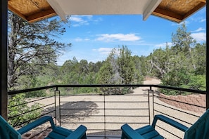 A balcony with a view of a forested area and a gravel path. - Zion's Emerald| Walk into East Zion| Amazing Stars (Orderville)