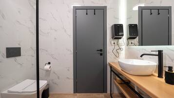 Deluxe Double Room, City View | Bathroom | Shower, hair dryer, towels, soap