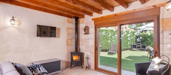 El Rincón de Carmina · house with garden and fireplace in Cantabria