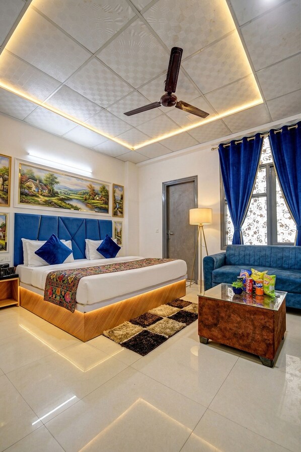 Chambre Deluxe double, 1 très grand lit, fumeur, vue sur la ville | Draps en coton égyptien, literie de qualité